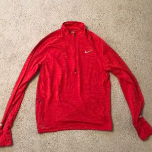 Red Nike dri-fit zip-up